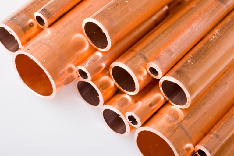Set,Of,Copper,Pipes,Of,Different,Diameter,Lying,In,One